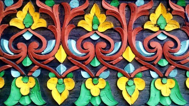This is a wood carve at Pagaruyung Palace, Batusangkar. I love the colour combination and its royal pattern:) 20130331_142416
